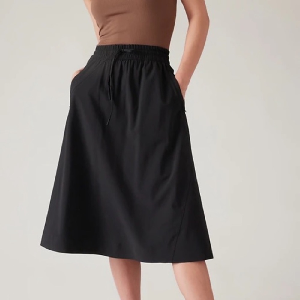 ATHLETA Arrival Skirt Relaxed Back Zip-Pockets Drawcord Black Midi Skirt Size 16